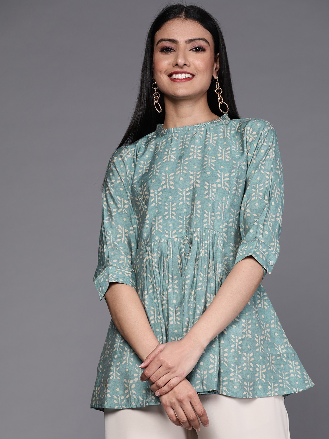 

Libas Green & Beige Ethnic Motifs Printed Pleated Kurti