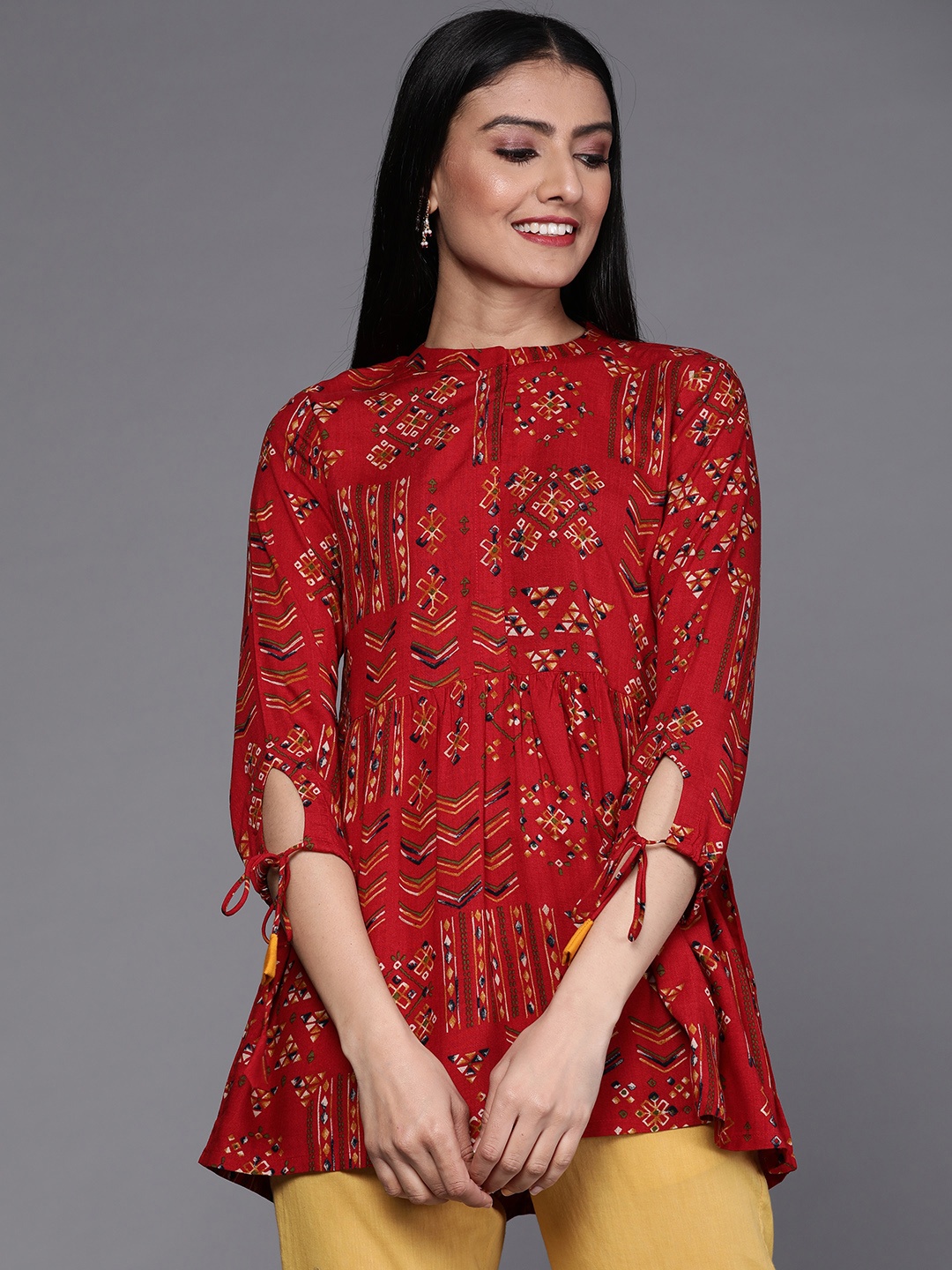 

Libas Red Ethnic Motifs Printed Pleated Kurti