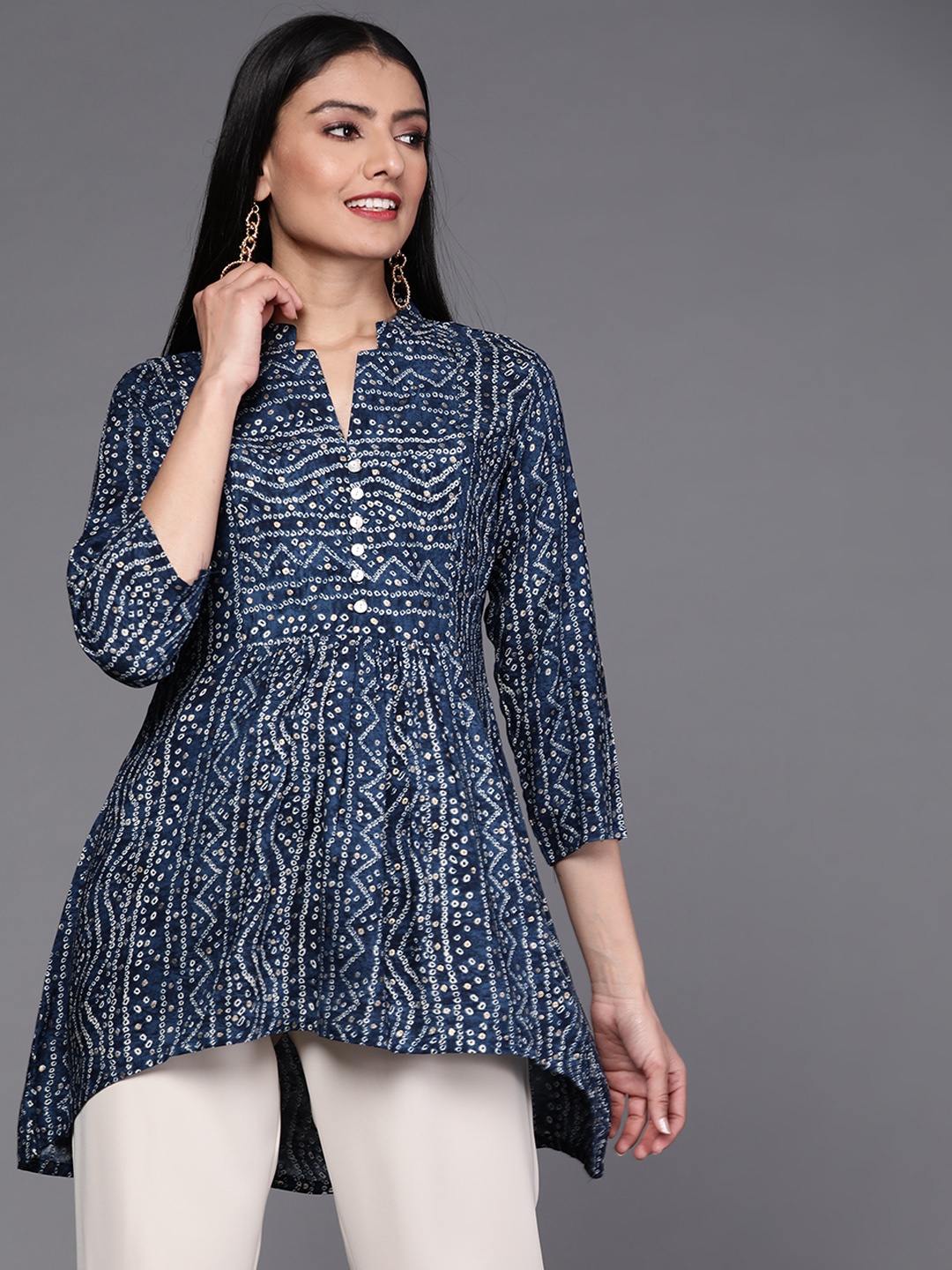 

Libas Navy Blue & White Bandhani Printed Pleated Kurti
