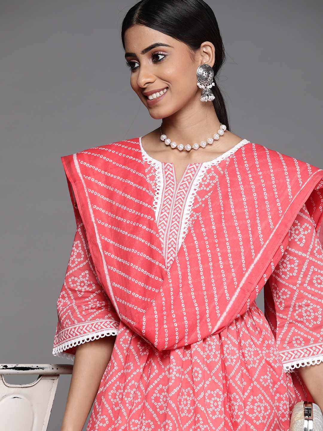 

Libas Women Coral Bandhani Printed Pleated Pure Cotton Kurta with Palazzos & With Dupatta