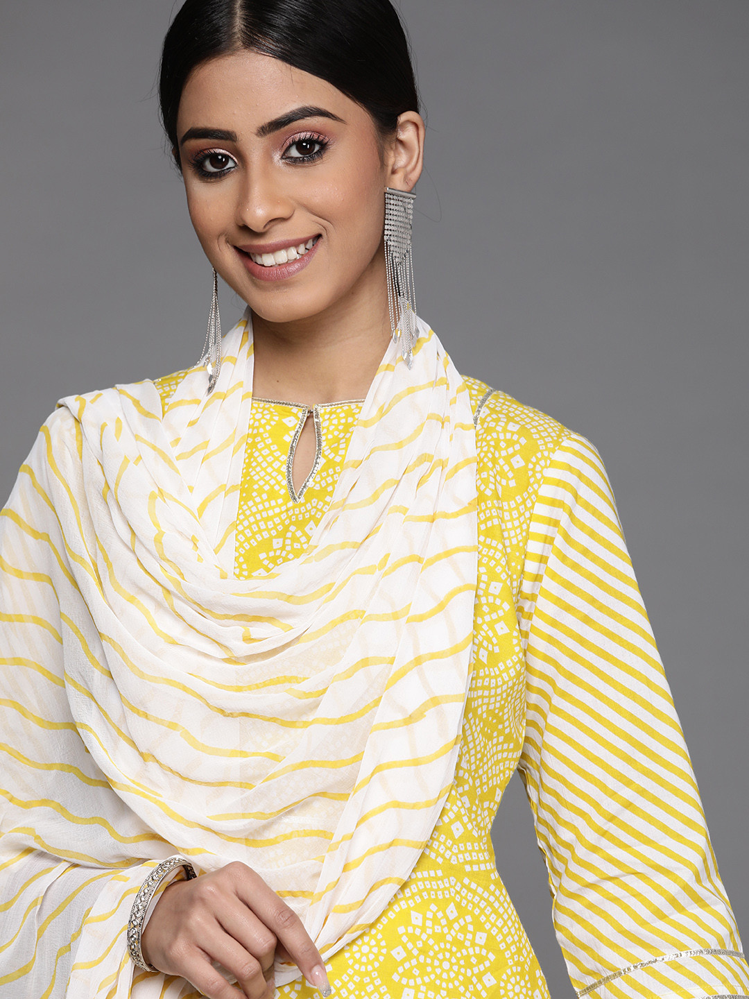 

Libas Women Yellow Bandhani Printed Gotta Patti Pure Cotton Kurta with Skirt & With Dupatta