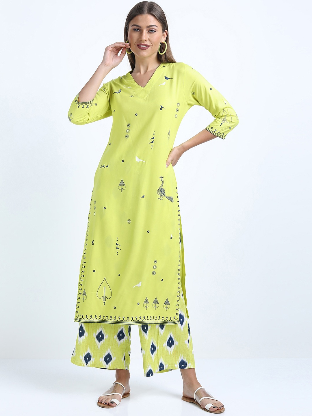 

Vishudh Women Green Printed Straight Kurti with Trousers