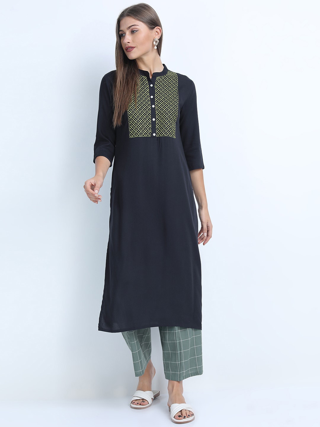 

Vishudh Women Navy Blue Floral Yoke Design Kurta with Trousers