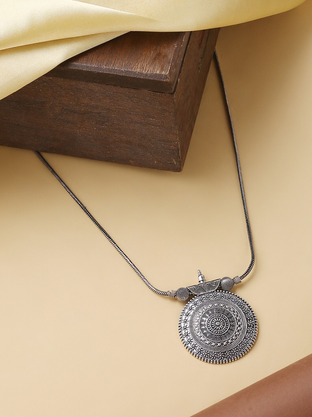 

VIRAASI Silver-Toned Oxidised Circular Pendant With Chain