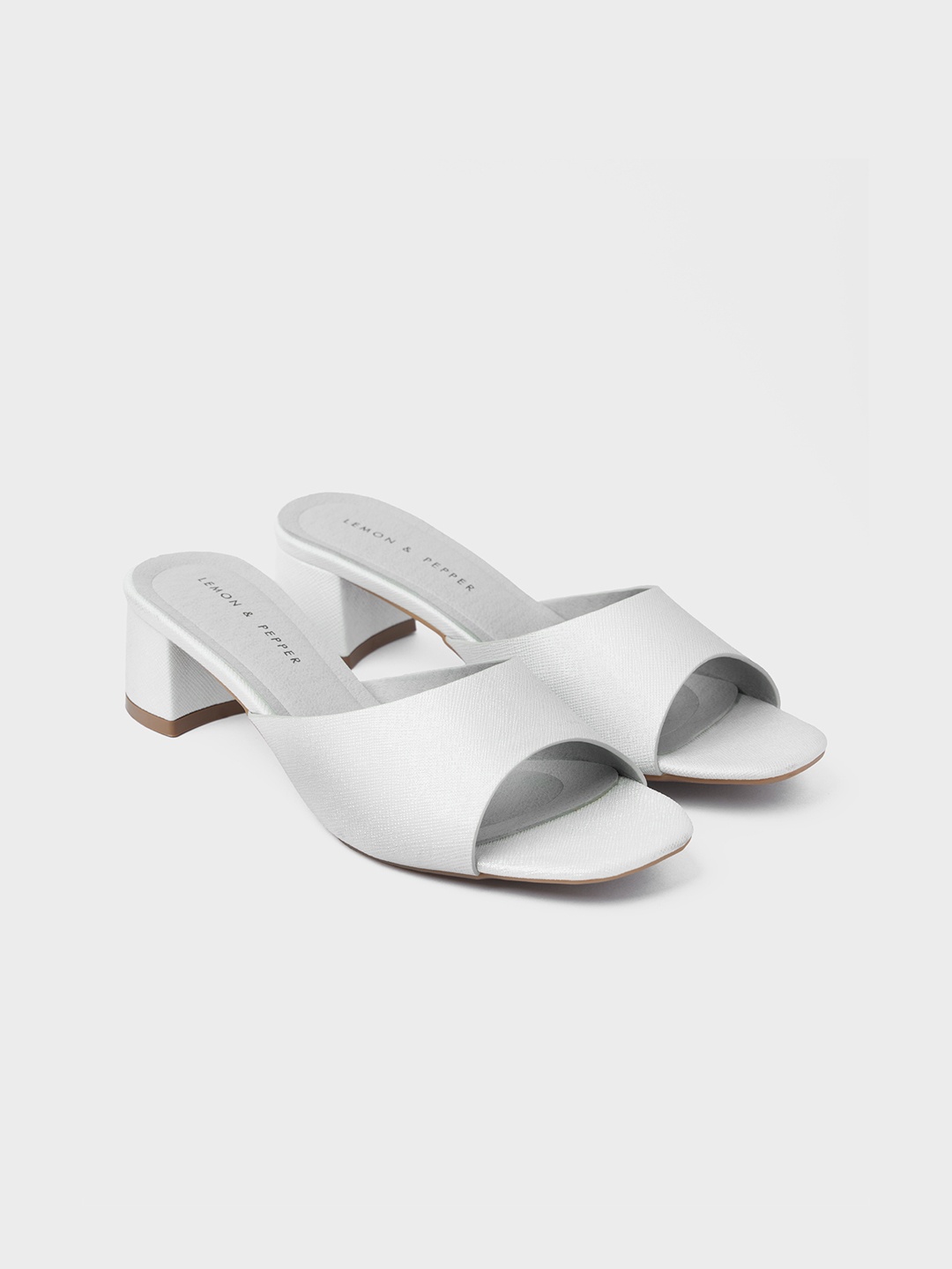 

LEMON & PEPPER White Textured Block Heel Mules