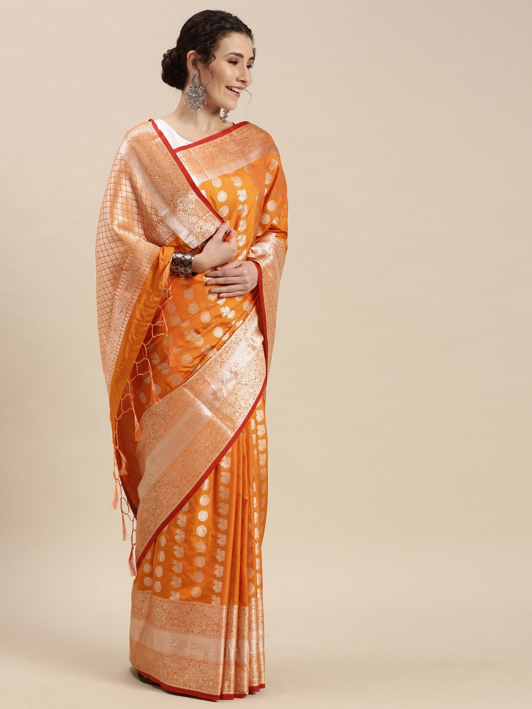 

Mitera Orange & Silver Ethnic Motifs Silk Blend Saree
