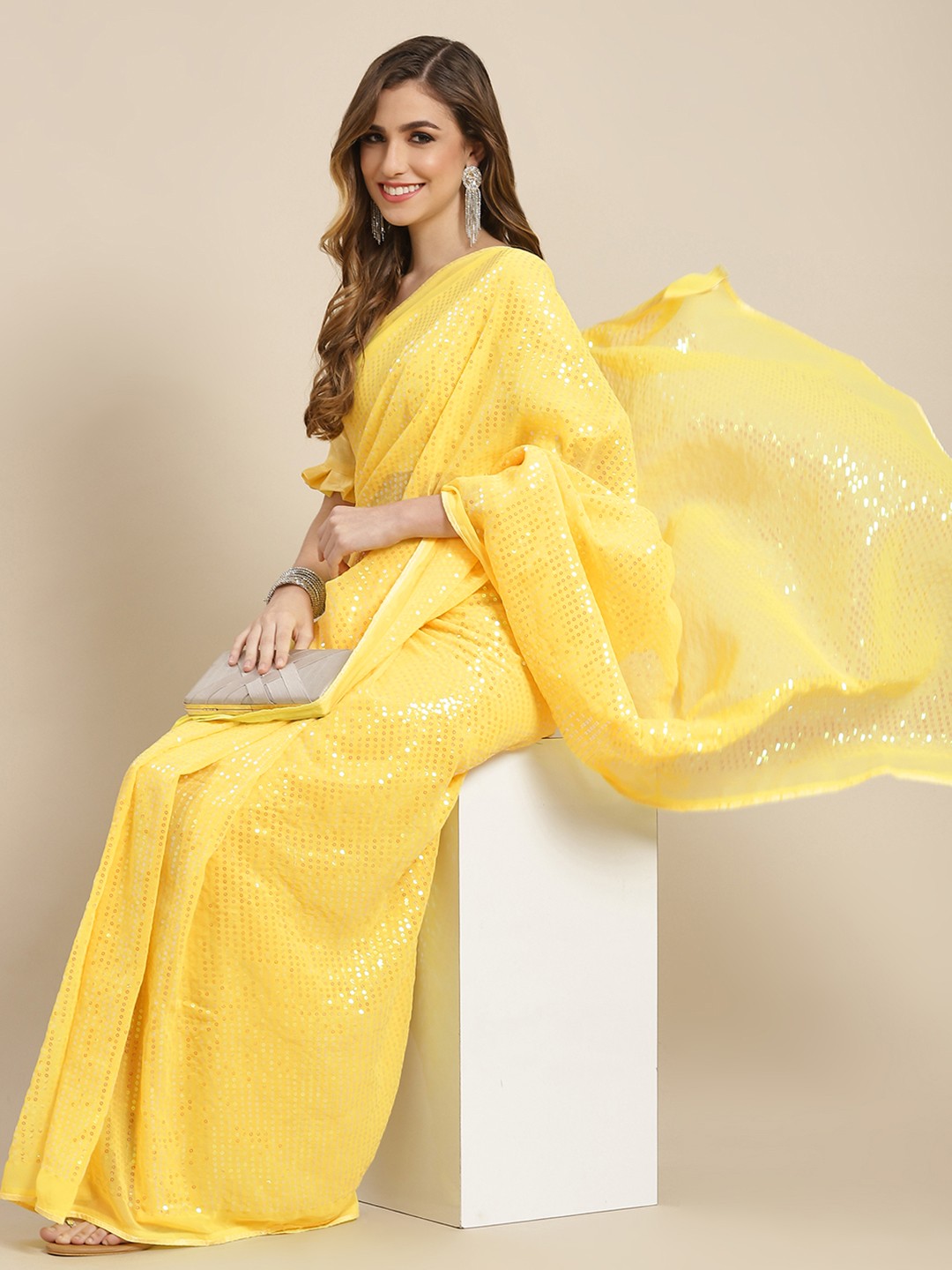

Mitera Yellow Striped Sequinned Pure Georgette Heavy Work Saree