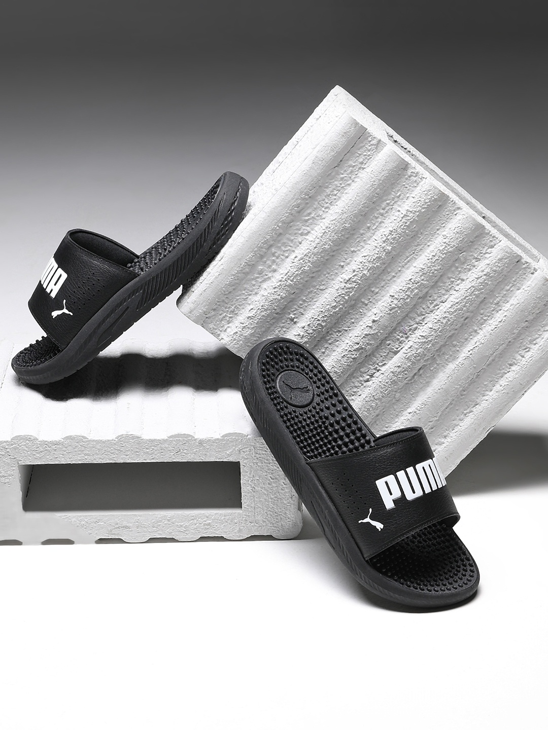 

Puma Men Black Printed Softride Slide Massage Sliders