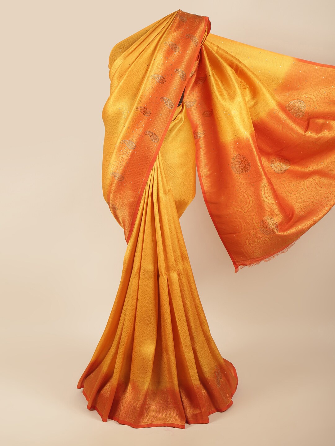 

Pothys Mustard & Orange Ethnic Motifs Beads and Stones Art Silk Saree