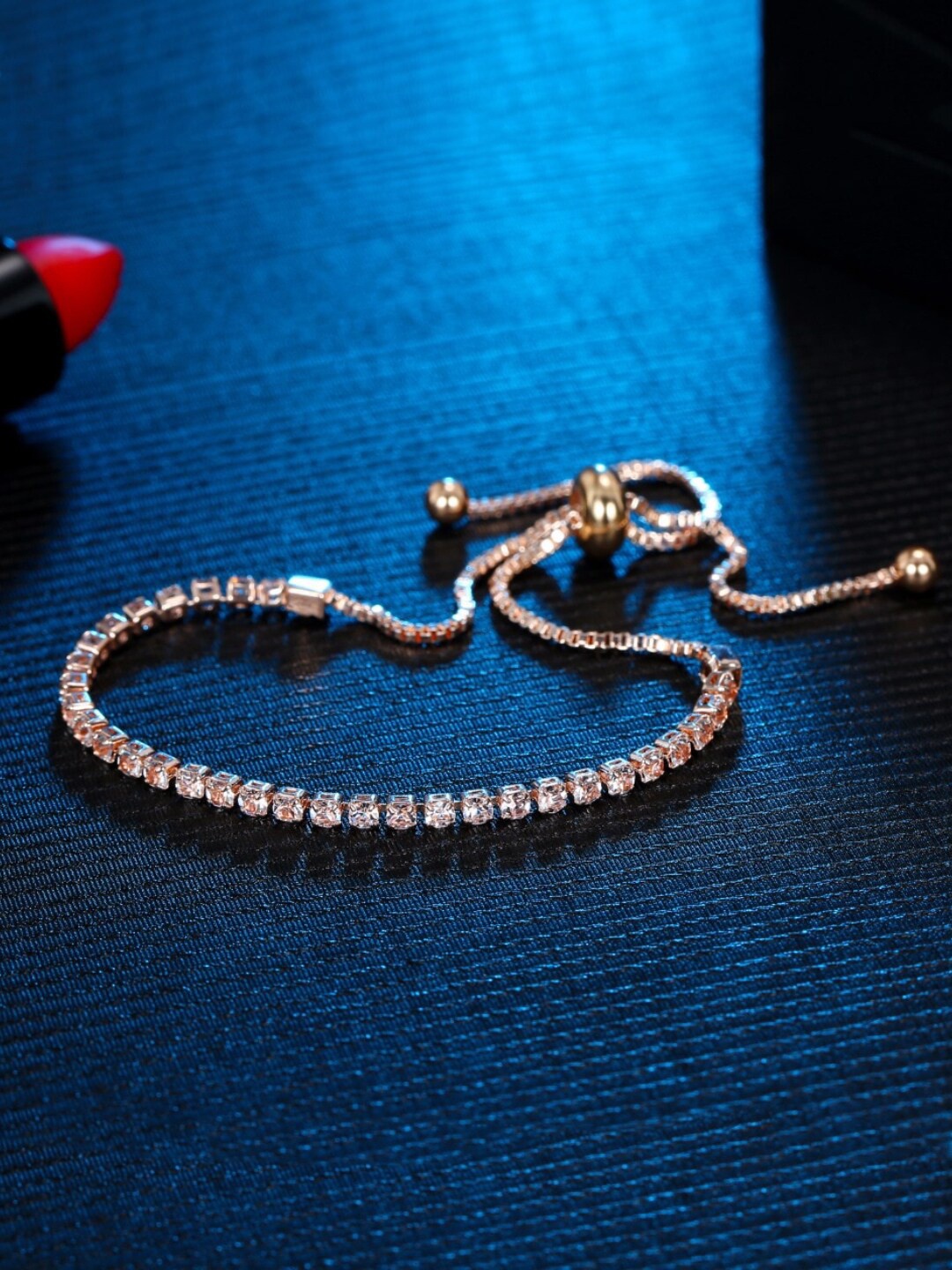 

Yellow Chimes Women Rose Gold Plated Crystal Studded Link Bracelet
