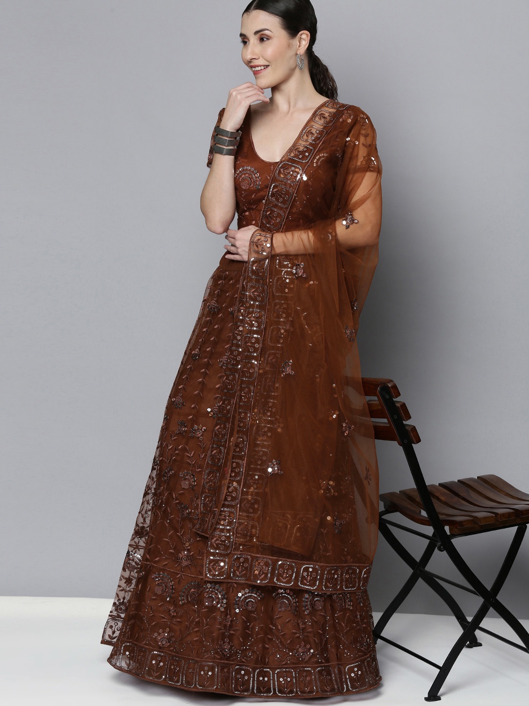 

Kvsfab Brown Embroidered Semi-Stitched Lehenga with Unstitched Blouse & Dupatta