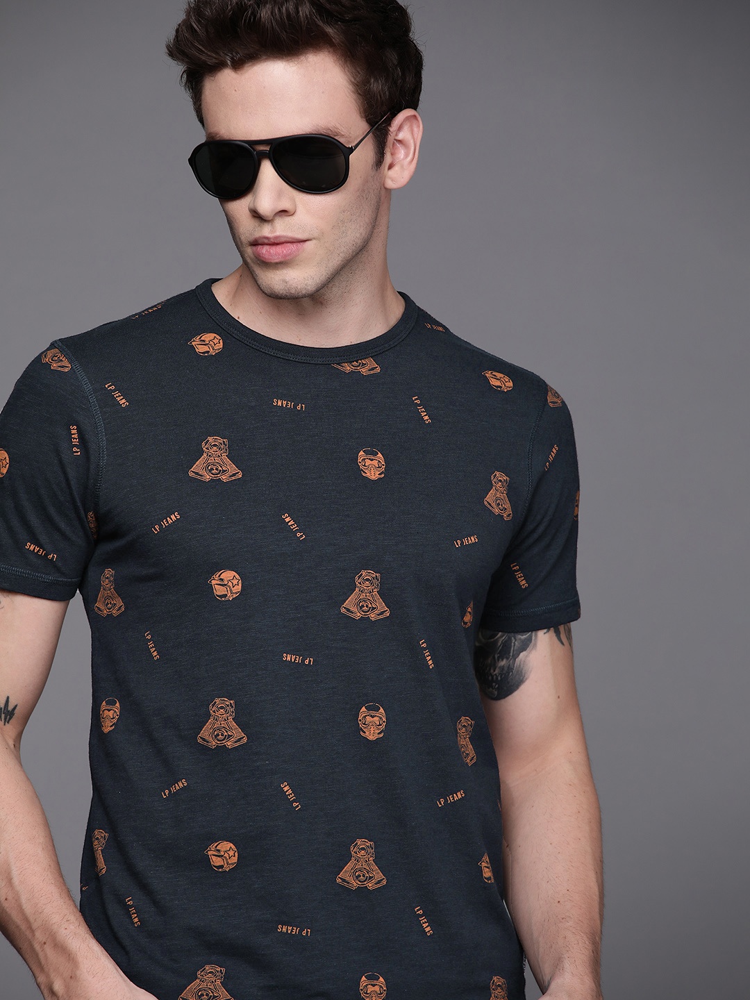 

Louis Philippe Jeans Men Navy Blue & Rust Brown Printed Pure Cotton T-shirt