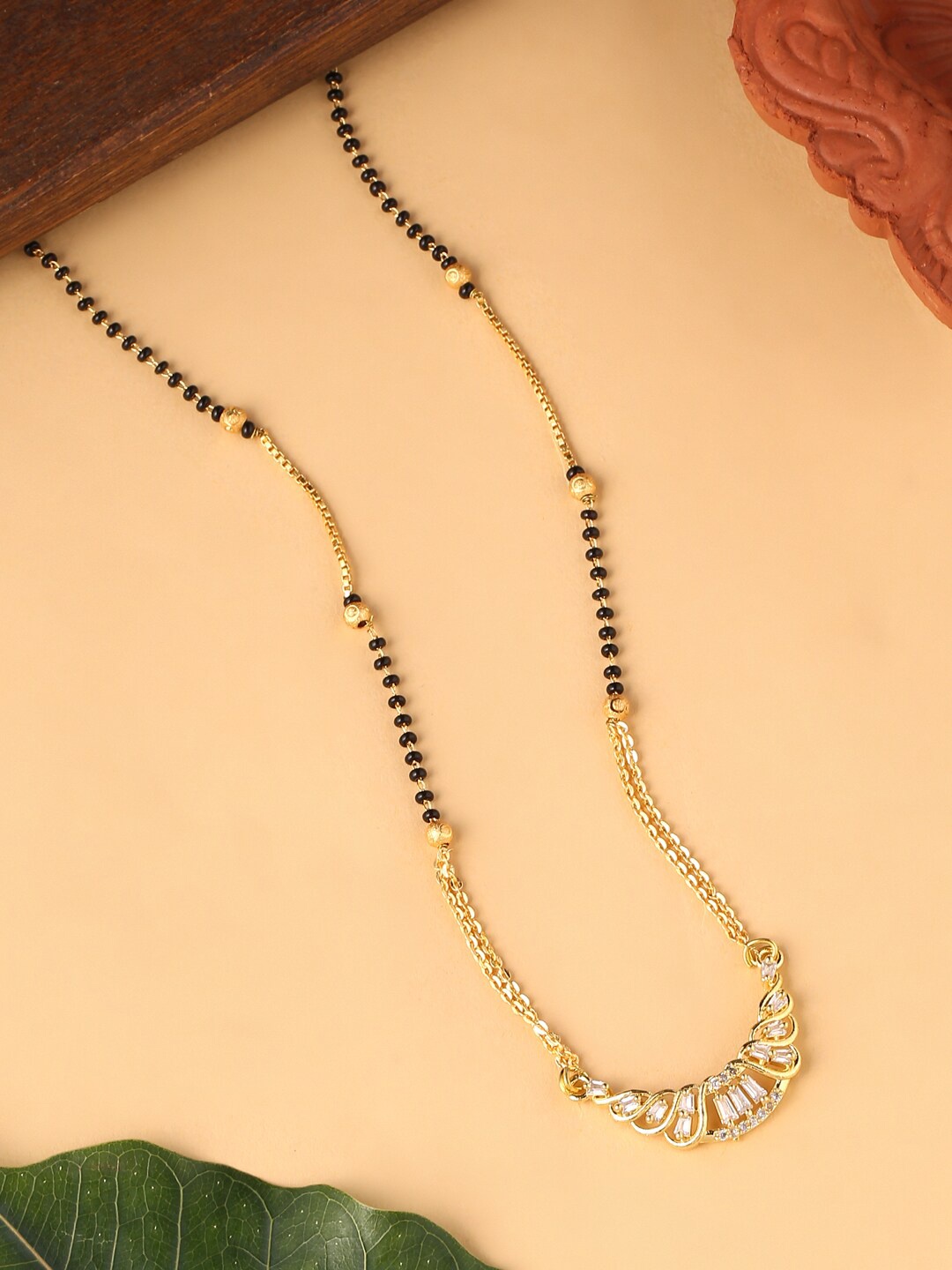 

VIRAASI Gold-Plated White Stone-Studded Black Beaded Mangalsutra