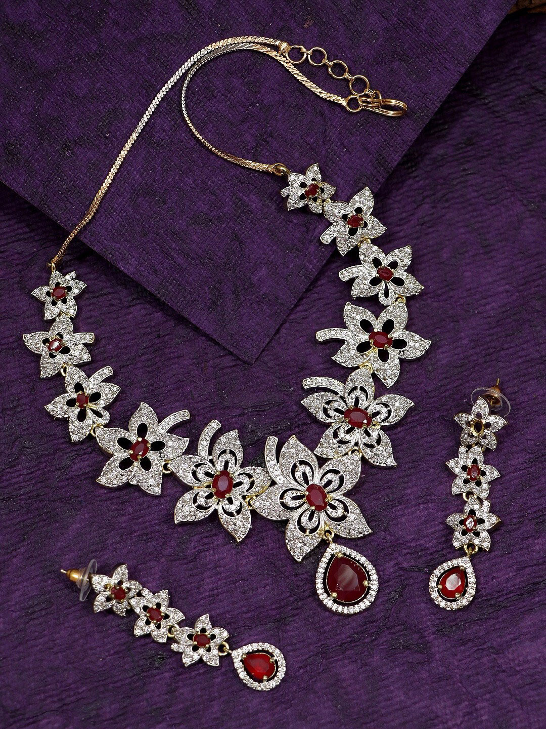 

Crunchy Fashion Gold Plated White & Red American Diamond Studded Floral Jewellery Set