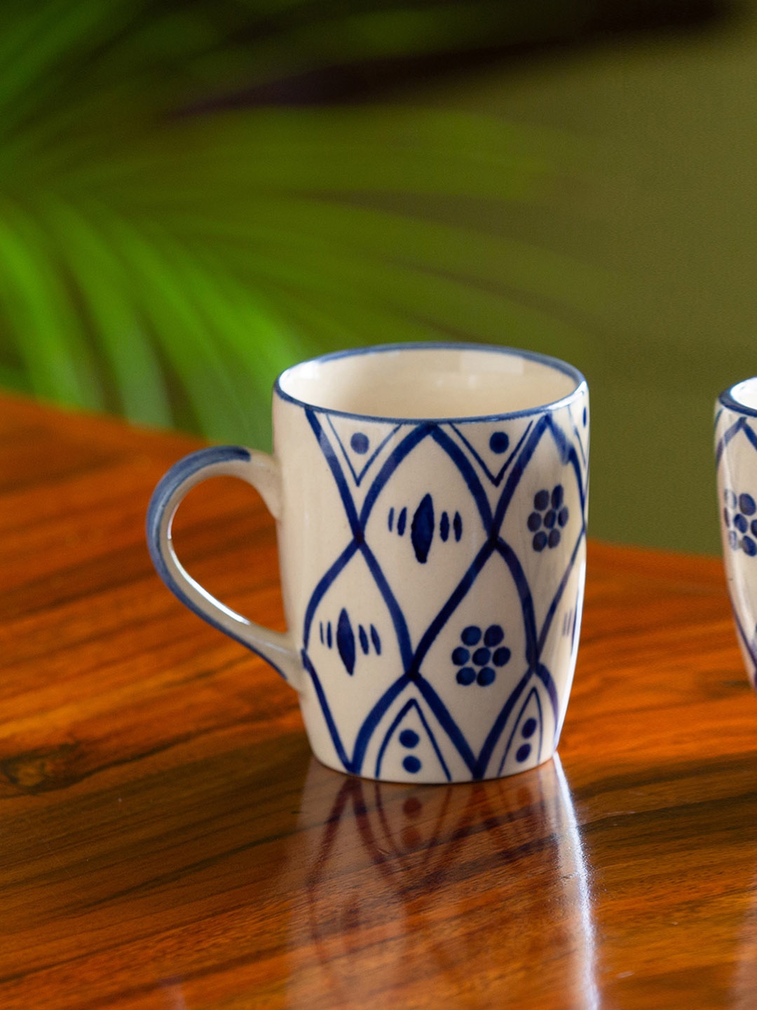 

ExclusiveLane White & Blue Handcrafted Solid Ceramic Glossy Coffee Mugs (300 ML)
