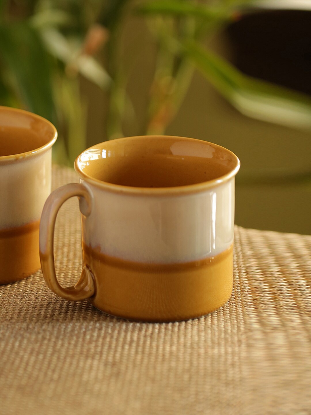 

ExclusiveLane Mustard Off White Colourblocked Ceramic Coffee Mug (320 ML)