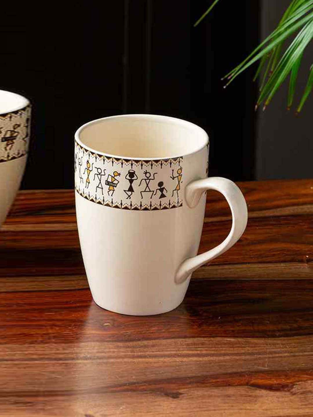 

ExclusiveLane Whispers of Warli Printed Ceramic Matte Coffee Mugs (300 ML), White