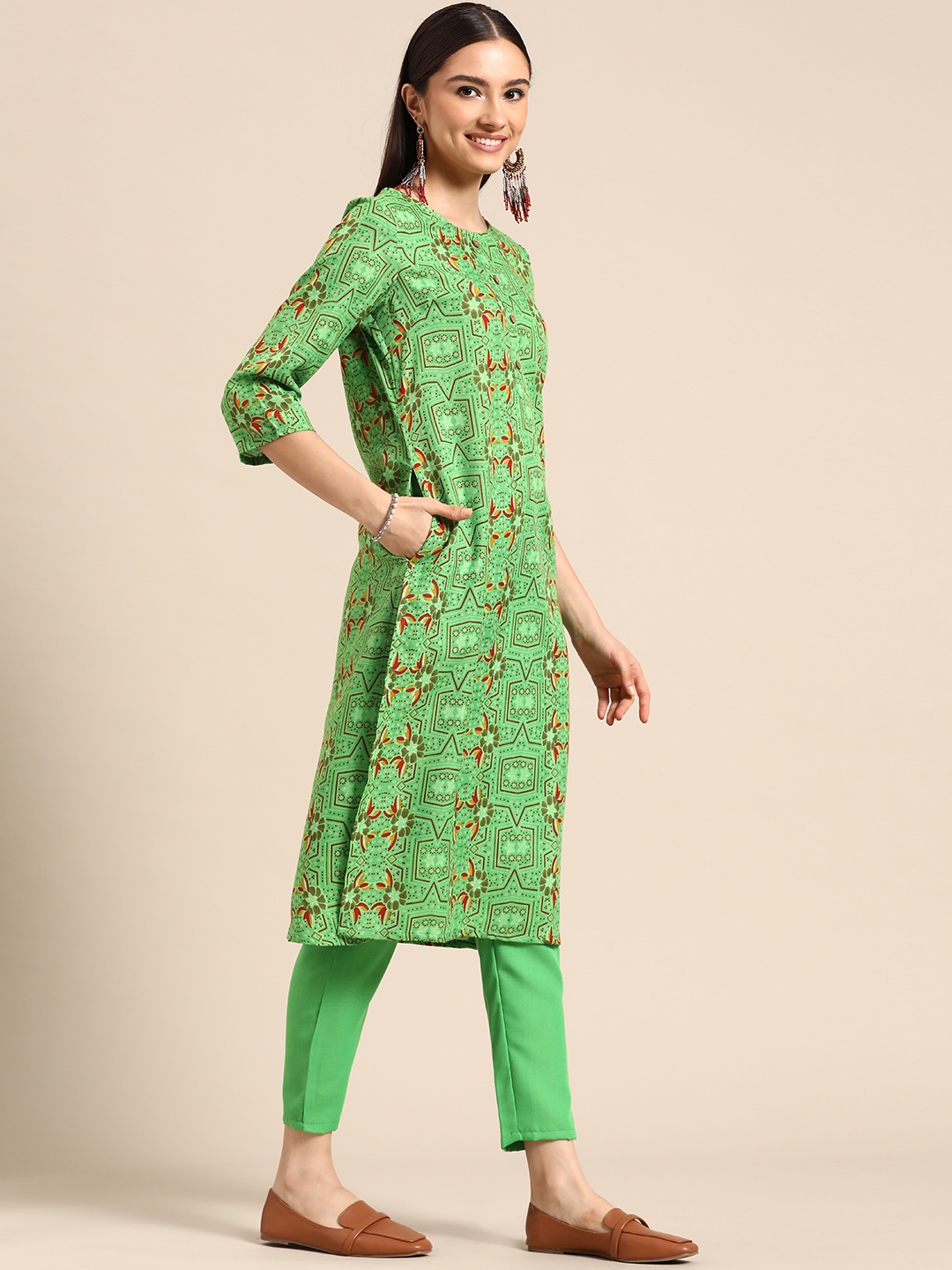 

Sangria Women Green & Rust Orange Printed Kurta with Trousers