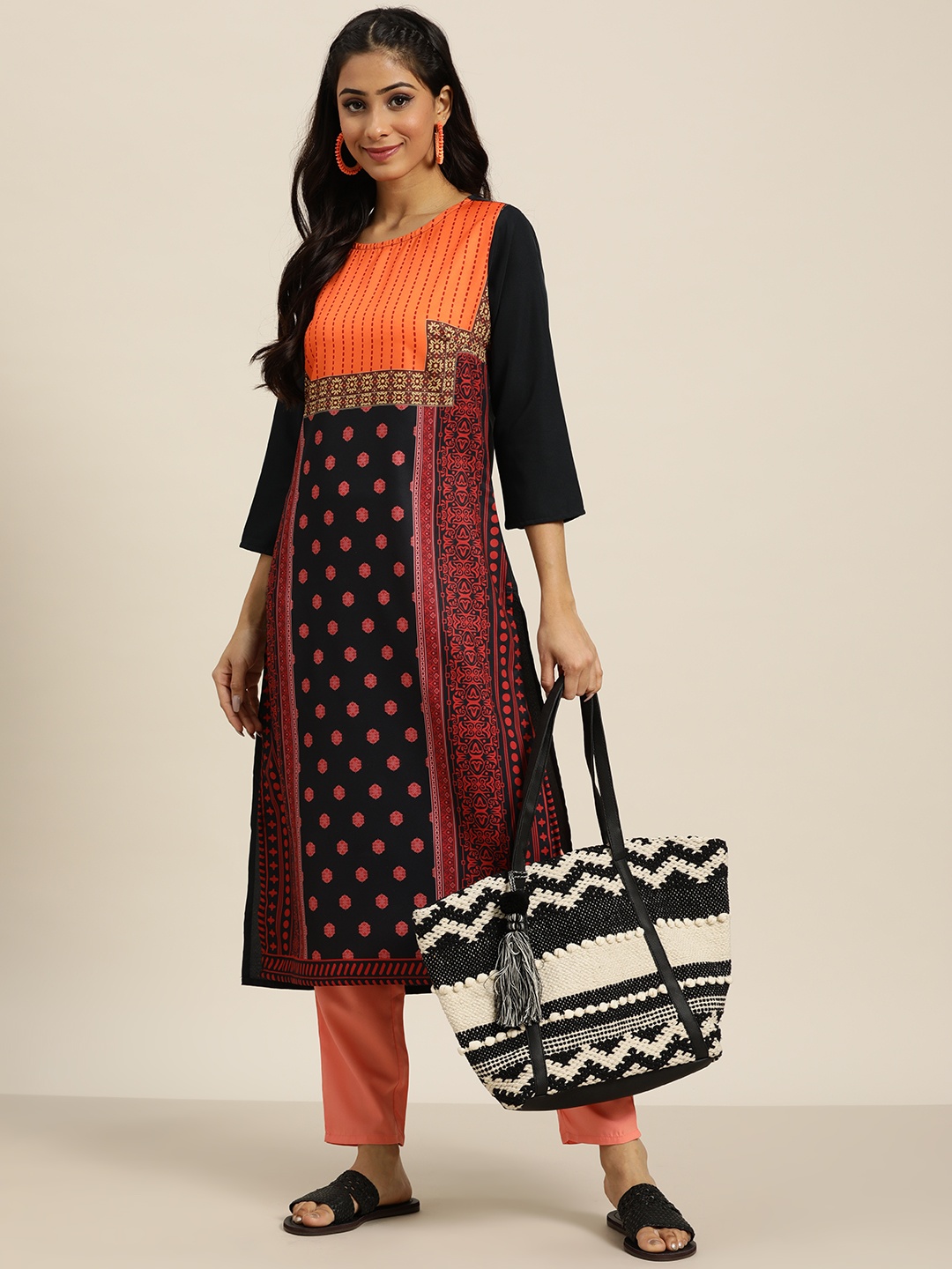 

Sangria Women Black & Orange Ethnic Motifs Printed Kurta