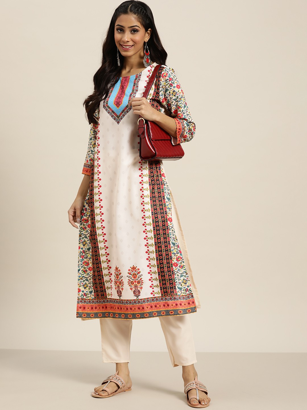 

Sangria Women White & Red Ethnic Motifs Printed Kurta with Solid Trousers