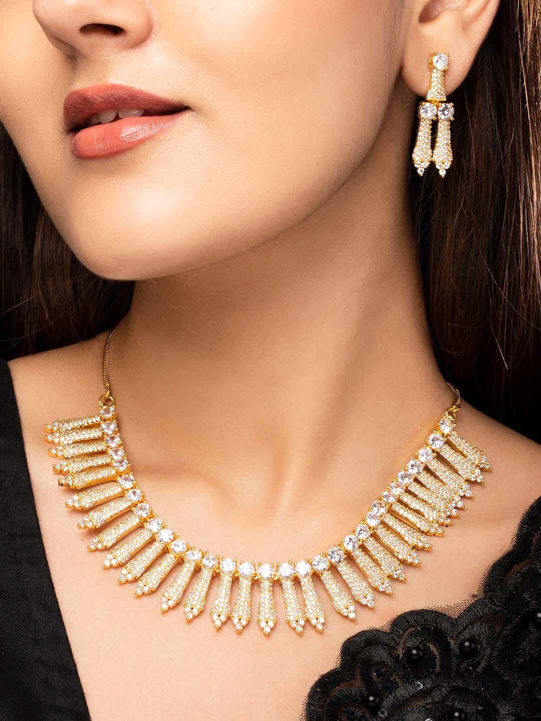 

Rubans Gold Plated Handcrafted AD Studded Necklace Set