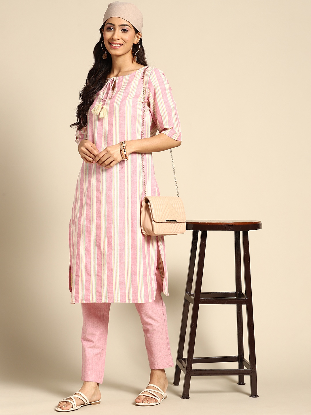 

Sangria Women Pink & Yellow Striped Kurta with Trousers