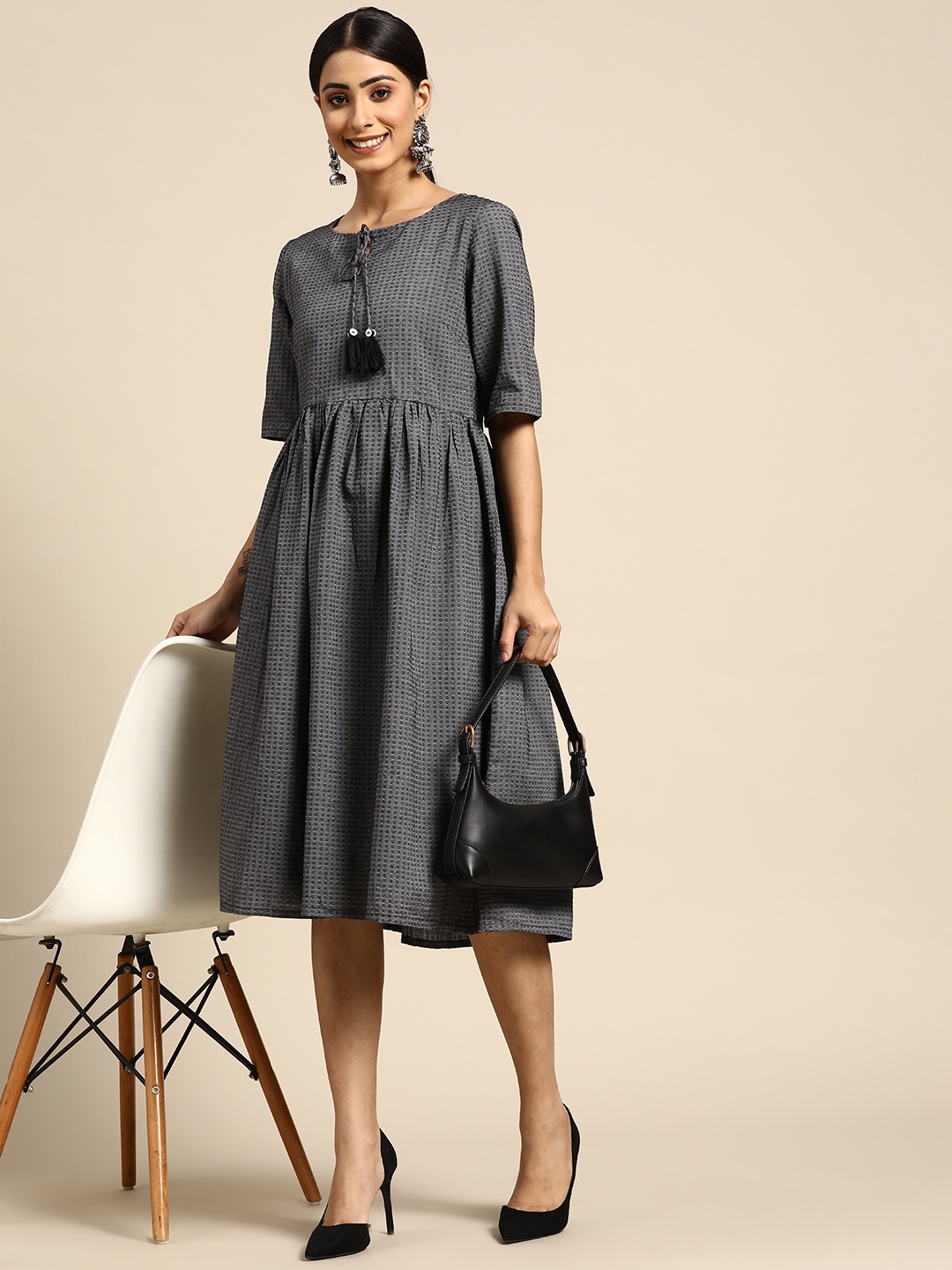 

Sangria Charcoal Grey Ethnic Motifs Embroidered Tie-Up Neck Ethnic A-Line Dress