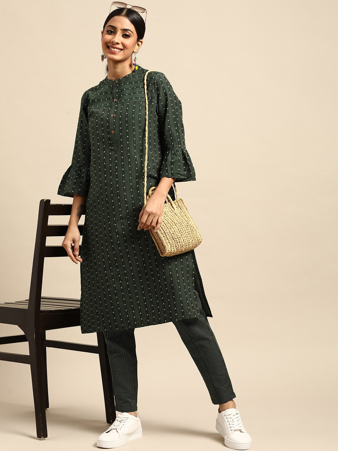 

Sangria Women Green & White Striped Thread Work Kurta with Trousers