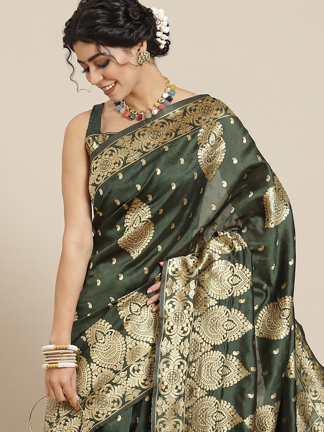 

Mitera Green Ethnic Motifs Zari Silk Blend Mysore Silk Saree