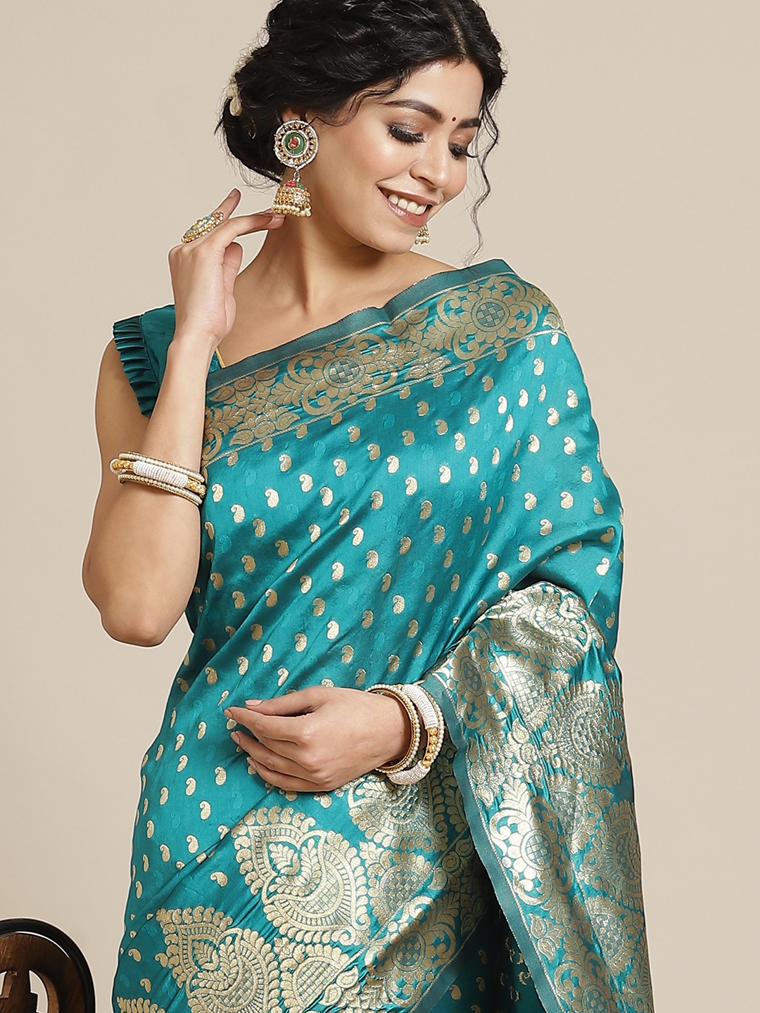 

Mitera Turquoise Blue Ethnic Motifs Zari Silk Blend Kanjeevaram Saree