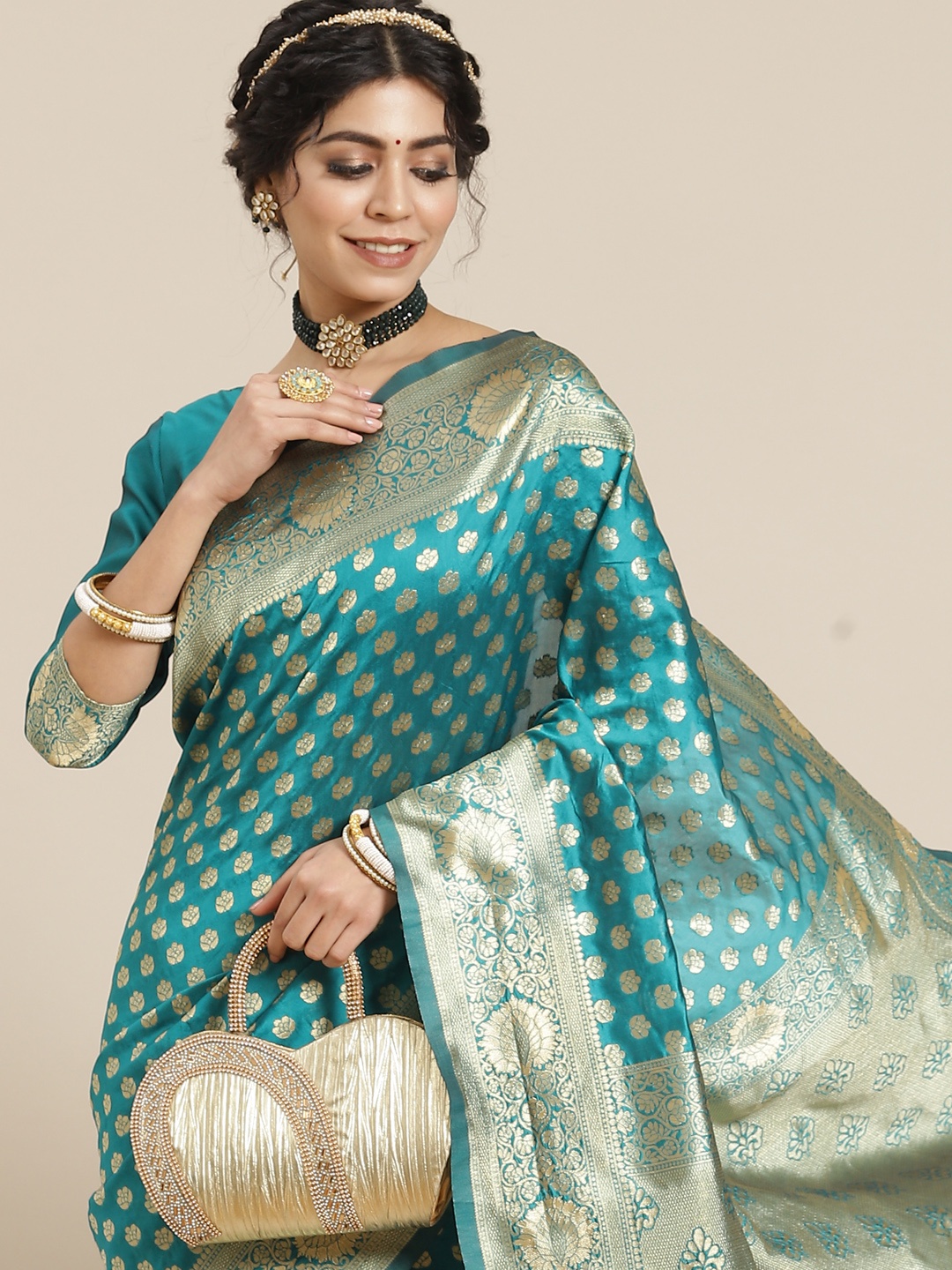 

Mitera Turquoise Blue Woven Design Zari Silk Blend Dharmavaram Saree