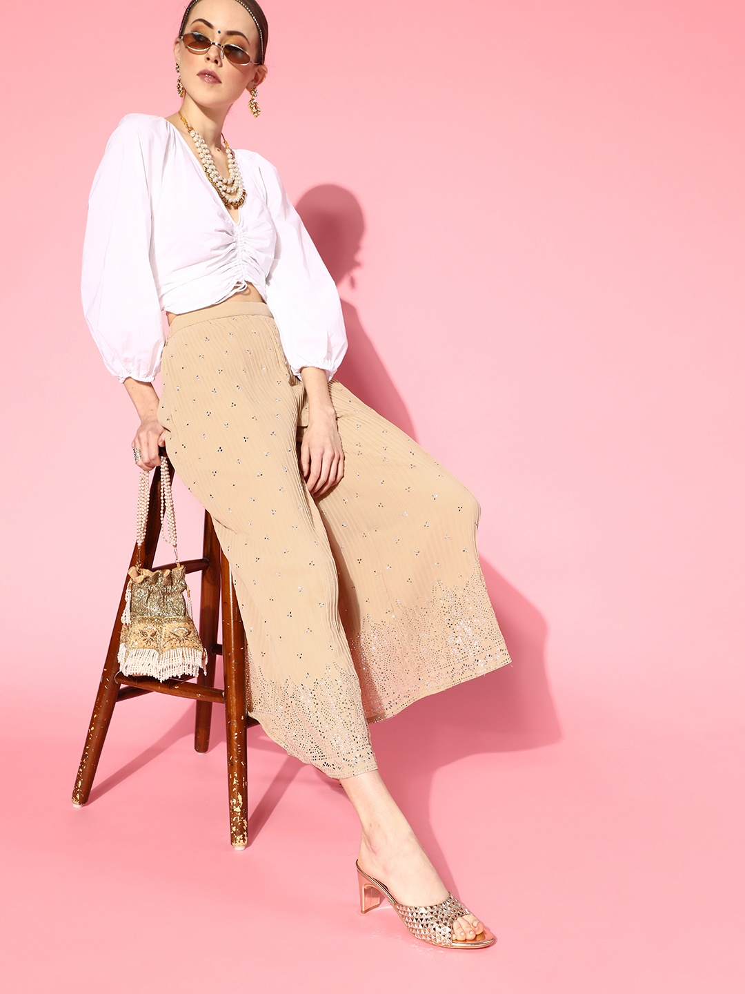 

Libas Women Beige Floral Elevated Bottom Palazzos