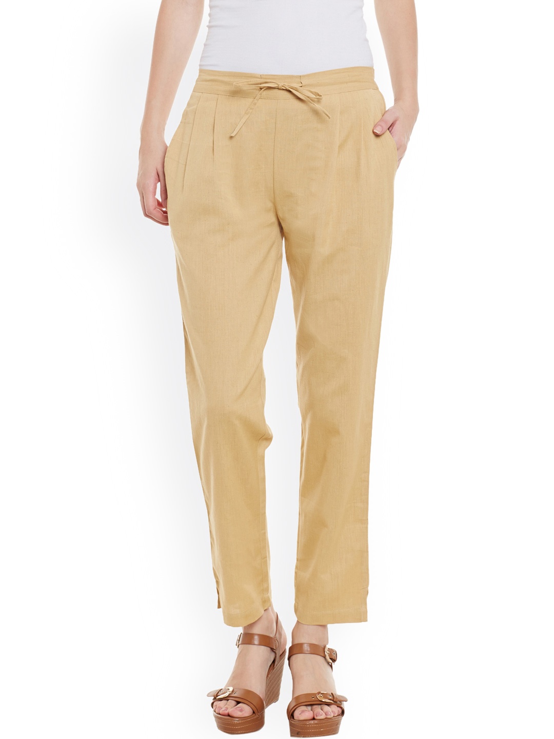 

Bitterlime Women Beige Solid Regular Fit Pleated Trousers