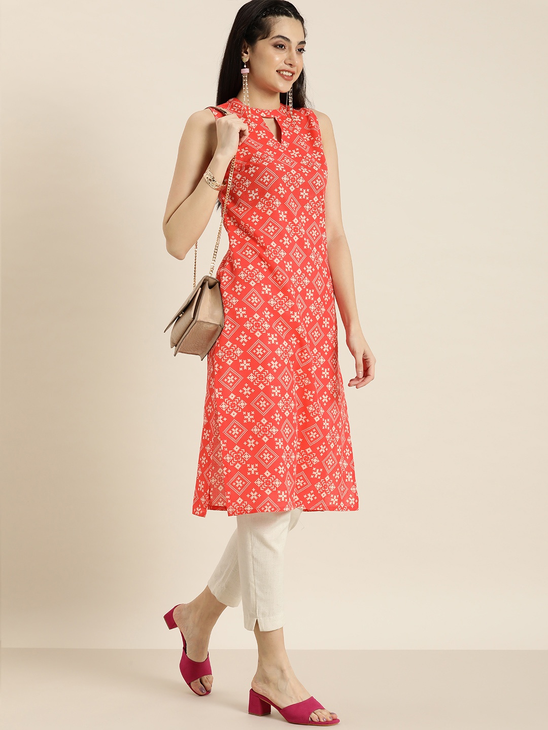 

Moda Rapido Women Coral Red & Off White Ethnic Motifs Printed Keyhole Neck Kurta