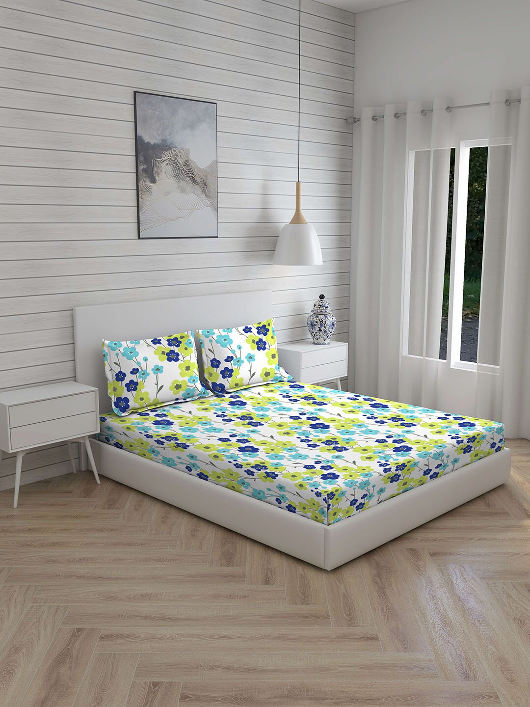 

Layers White & Green Floral Printed 230 TC 1 King Bedsheet with 2 Pillow Covers