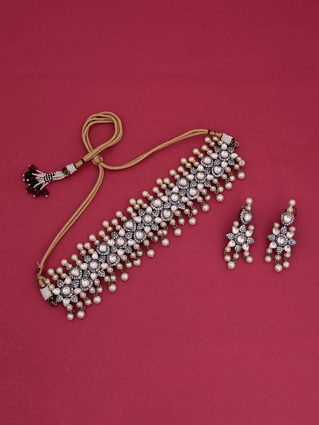 

Tistabene Gold-Toned Kundan & Pearls Studded Choker Jewellery Set