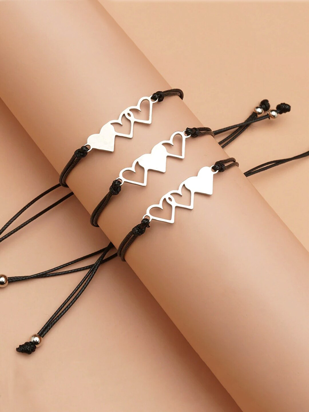 

Yellow Chimes Women Set Of 3 Black & Silver-Toned Heart Design Wraparound Bracelet