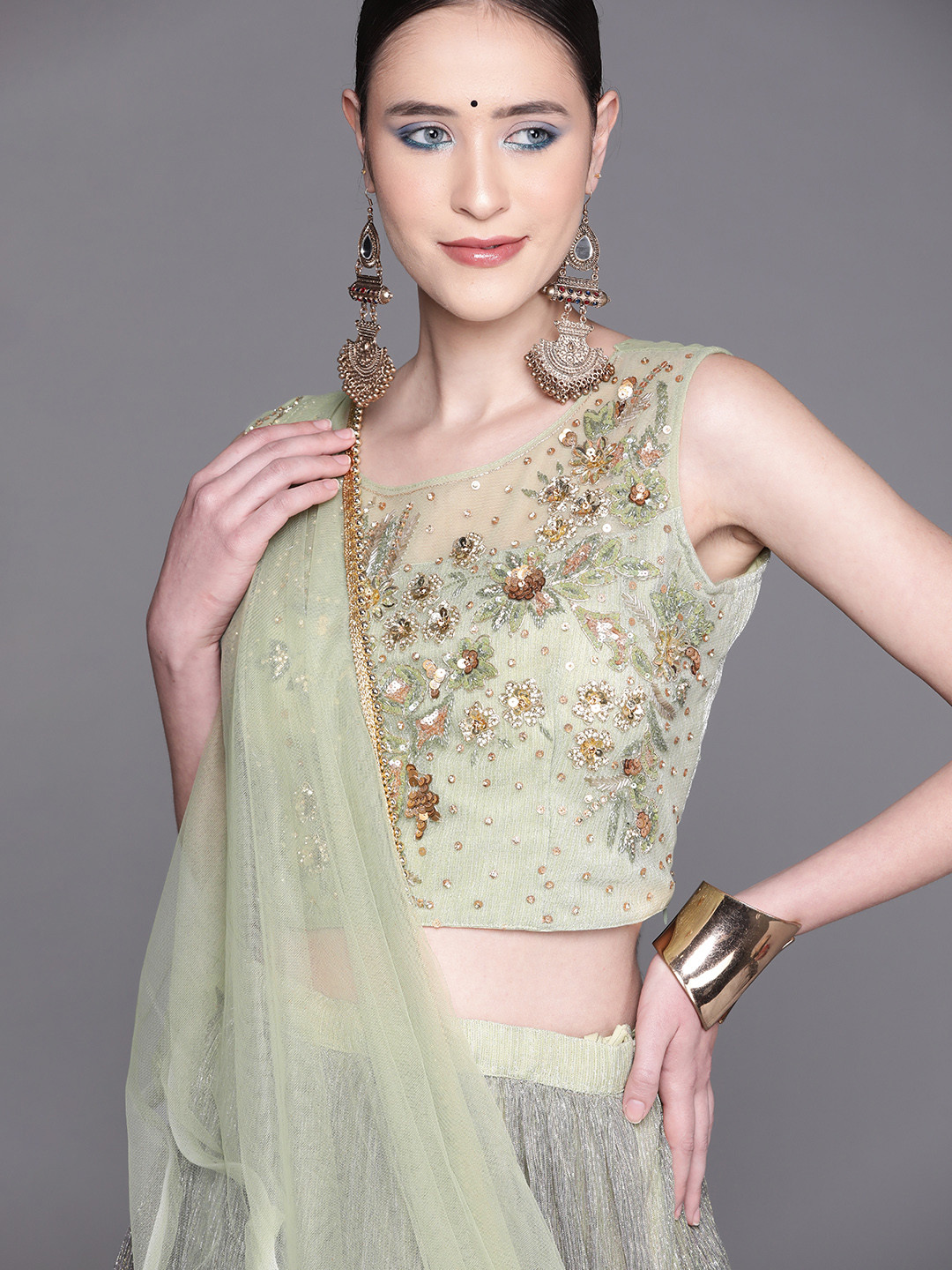 

Mitera Women Green & Golden Embroidered Lehenga & Blouse With Dupatta