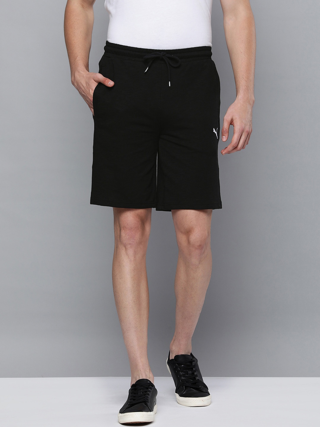 

Puma Men Black Solid Mid Rise Above Knee Slub Shorts