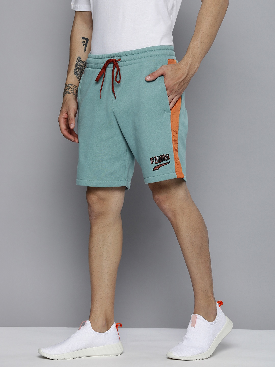 

Puma Men Blue & Black T7 BTL Printed Sports Sustainable Shorts