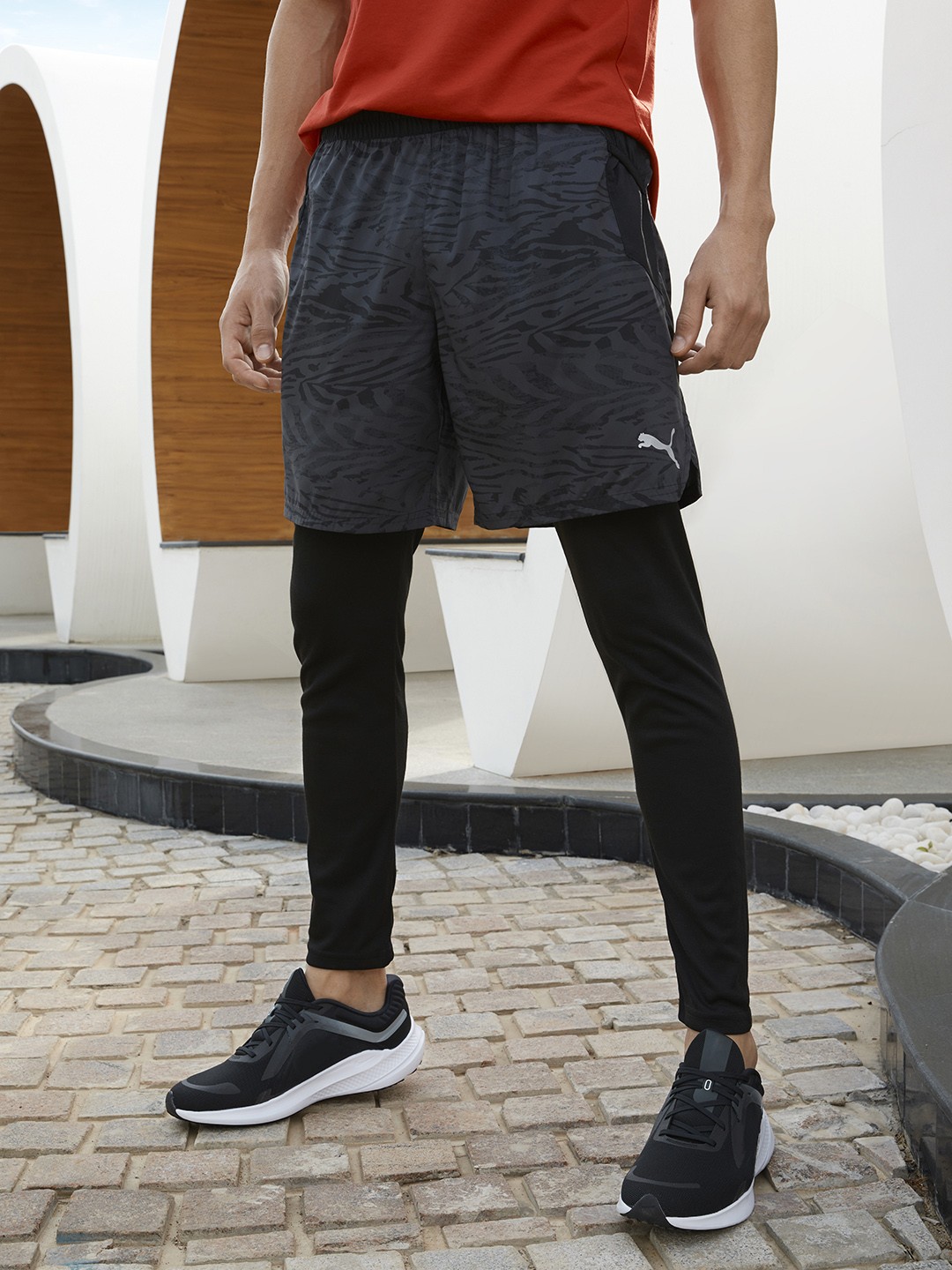 

Puma Men Black Printed Mid-Rise Running Sports Sustainable Shorts