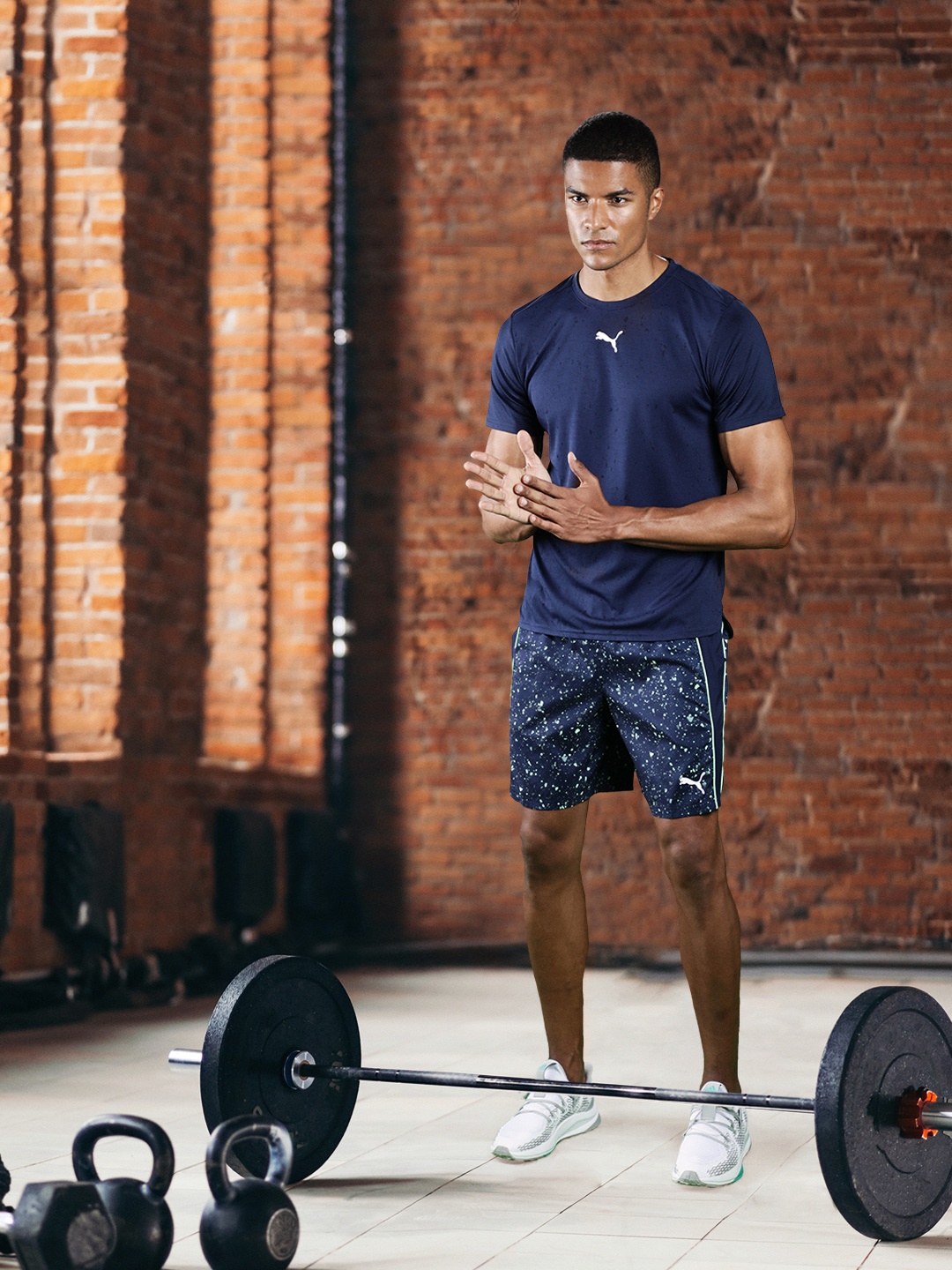 

Puma Men Navy Blue Abstract Printed Training dryCELL Sports Shorts