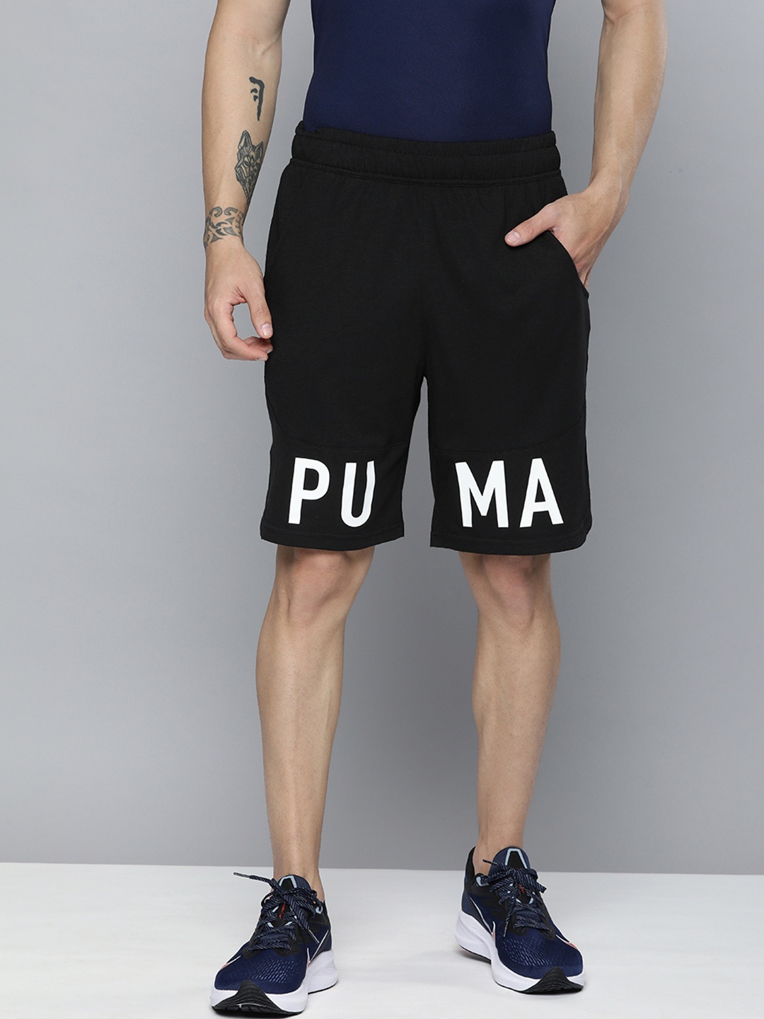 

Puma Men Black Typography Printed Knee Length Training Shorts