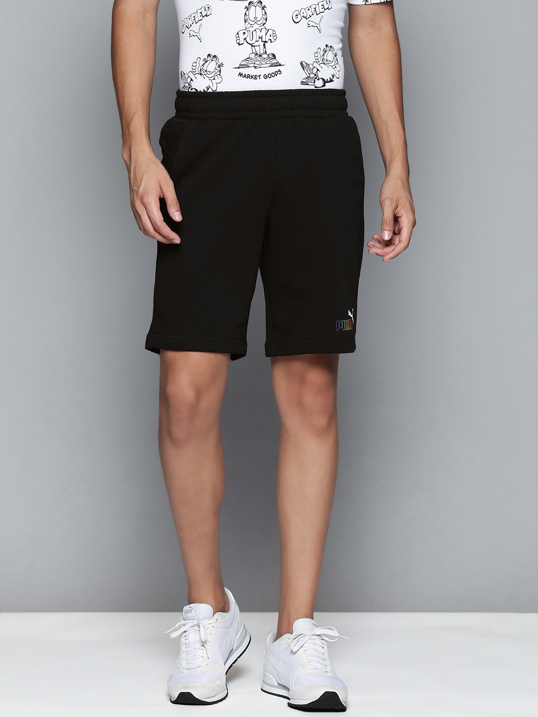 

Puma Men Black Brand Logo Printed Mid-Rise Sports Shorts