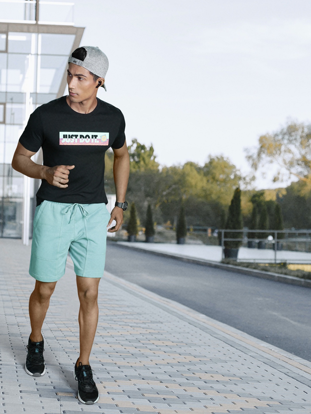 

Puma Men Solid Downtown Mid-Rise Regular Fit Sustainable Shorts, Teal