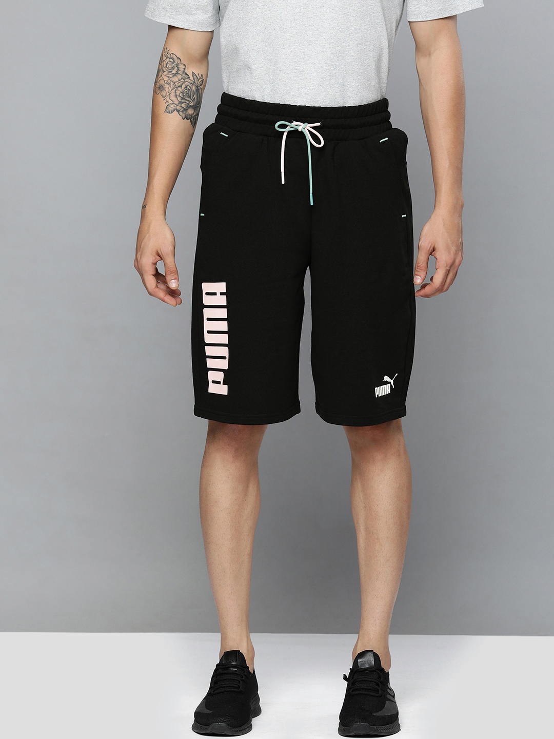 

Puma Men Black Typography Printed Loose Fit Shorts