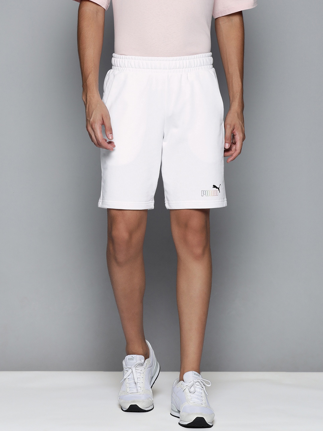 

Puma Essentials+ Rainbow Men White Solid Mid Rise Rainbow Sweat Shorts