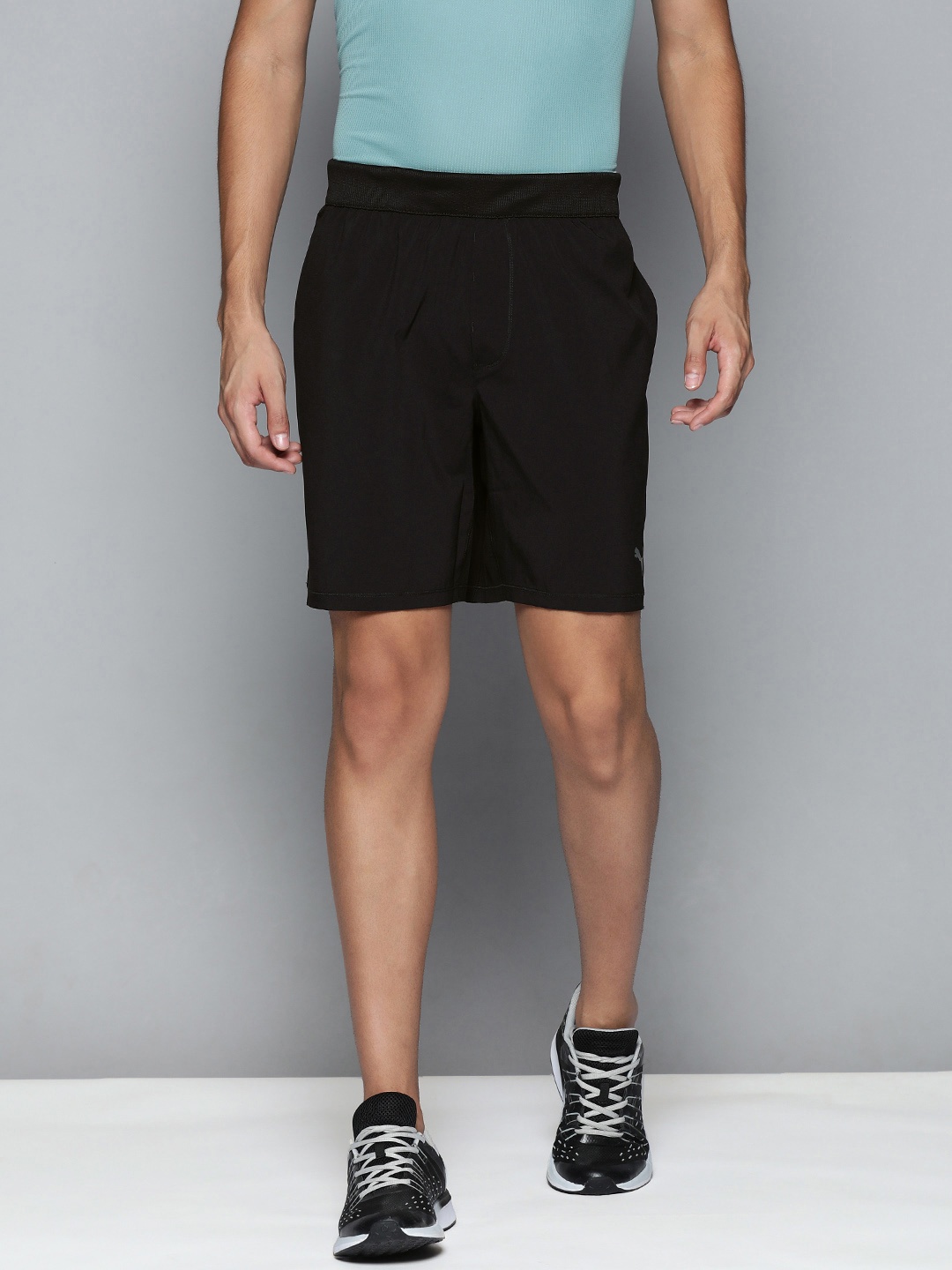 

Puma Studio Woven 7" Men Black Solid Mid Rise Woven Yoga Shorts