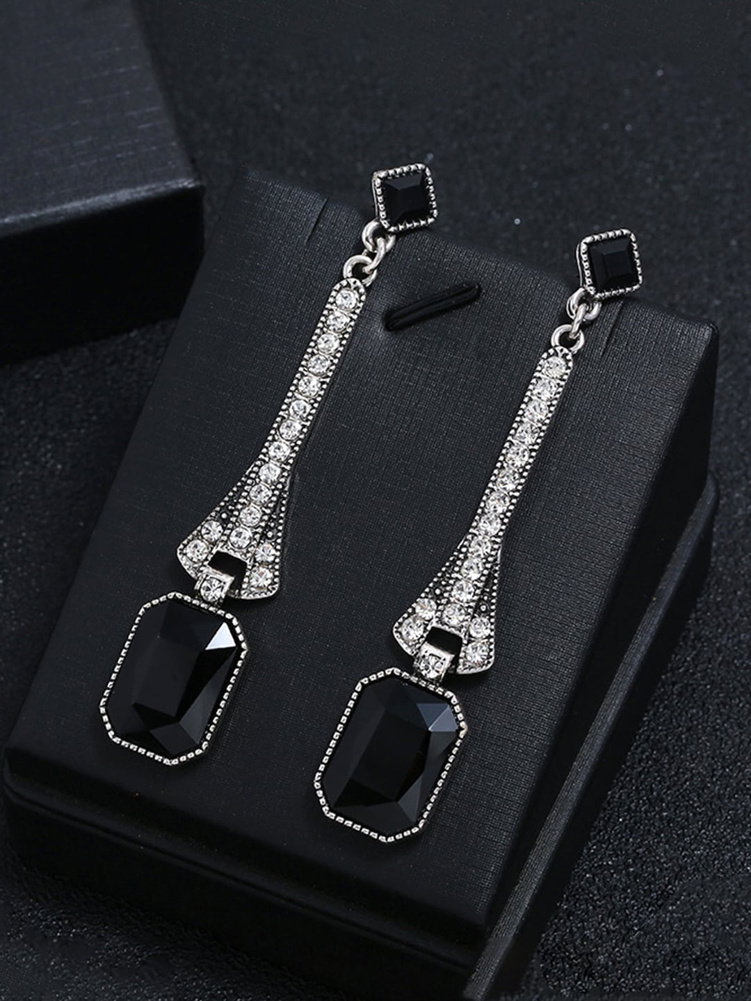 

Yellow Chimes Black Crystal Studded Drop Earrings