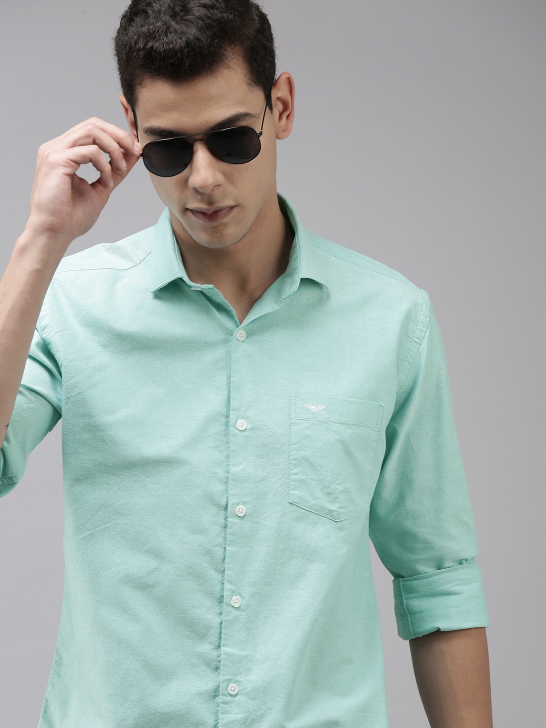 

Park Avenue Men Turquoise Blue Solid Slim Fit Pure Cotton Semiformal Shirt